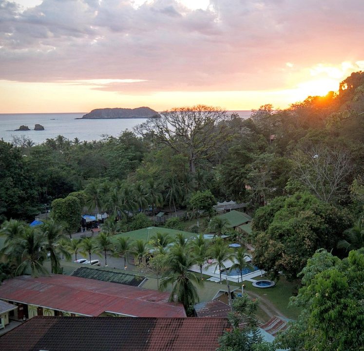 Aerial view of an eco-lodge immersed in nature, designed for sustainable living, low-impact tourism, and lasting environmental balance.